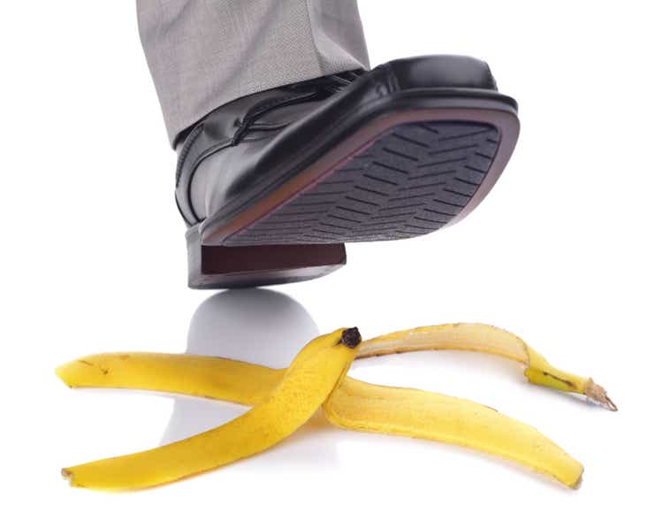 A person about to slip on a banana peel