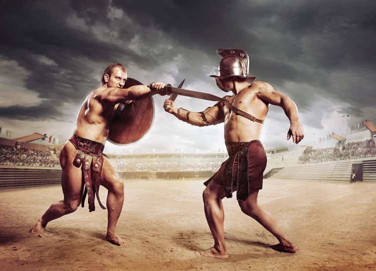 Gladiators fighting on the arena of the Colosseum