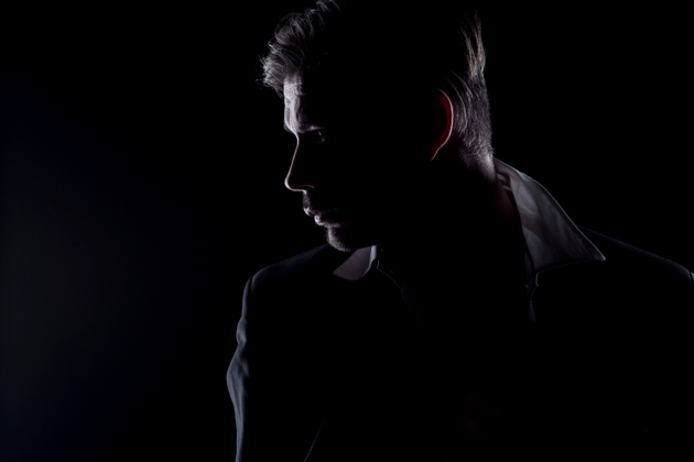 Man"s silhouette in the dark