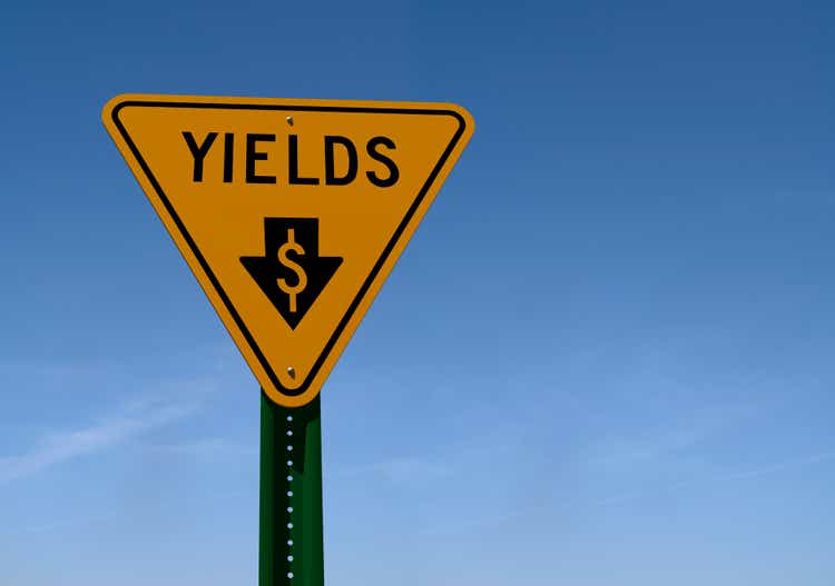 yields sign with downward pointing arrow