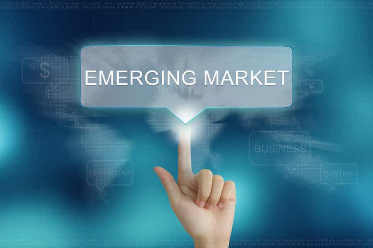 hand clicking on emerging market button