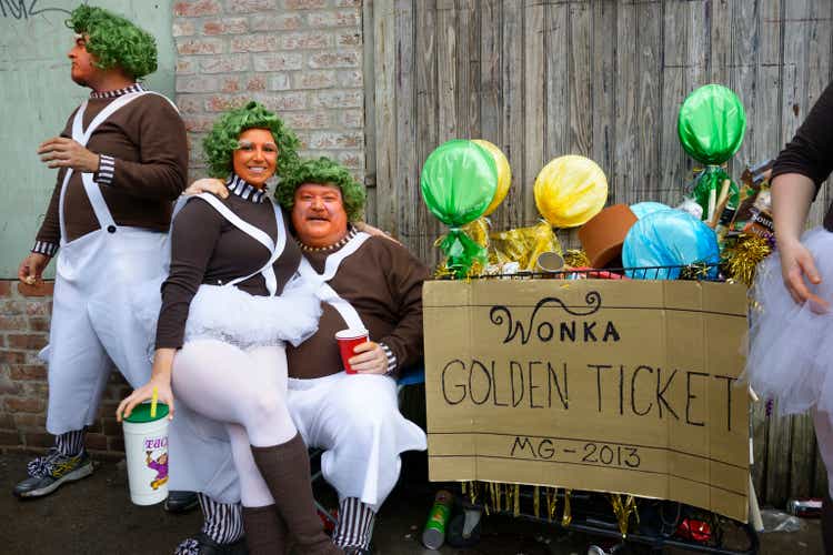 People wearing Willie Wonka costumes at Mardi Gras