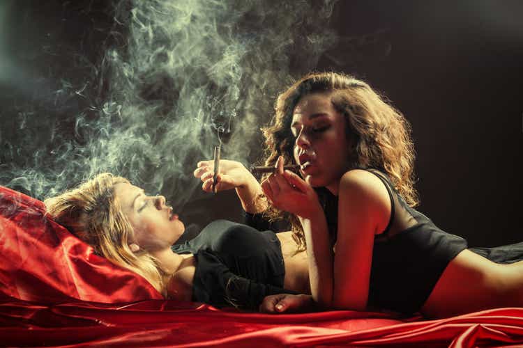 woman smoking couple