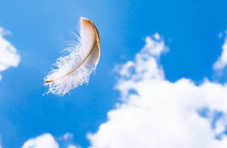 Floating feather in the sky