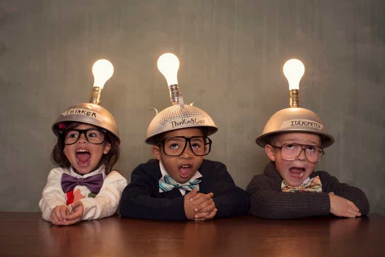 Young Intelligent Children Nerds wearing Thinking Caps