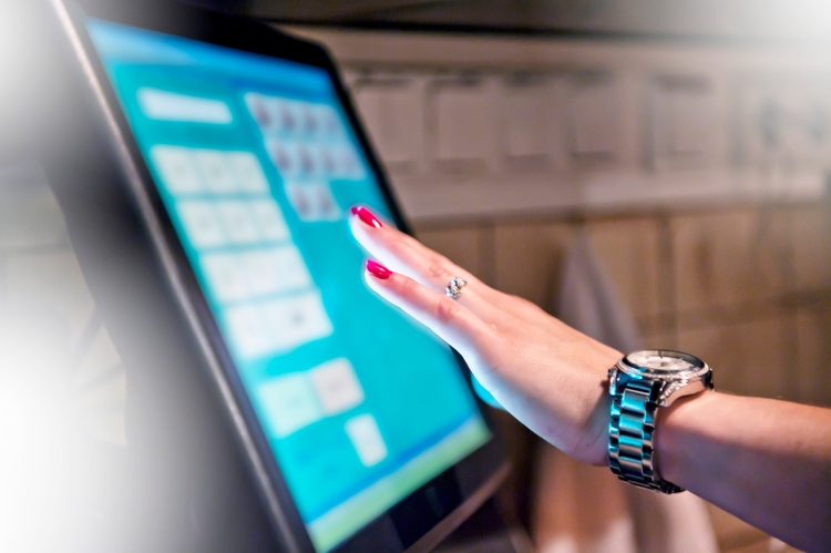 Bartender at the point of sale terminal