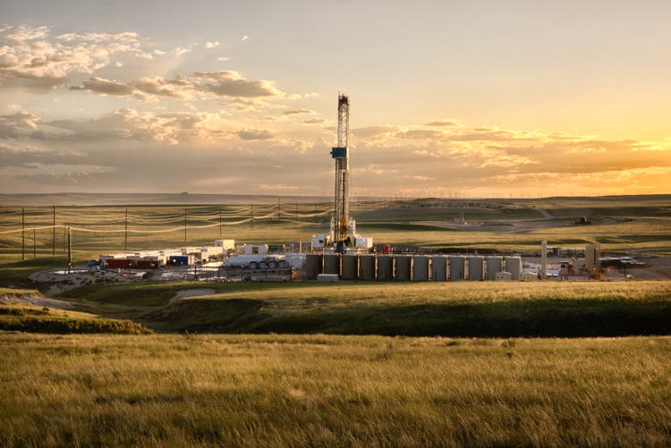 Fracking Fracking Drill Rig on the Prairie at Dusk