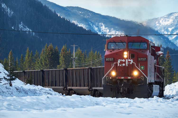 Canadian Pacific train coming round the bend in winter