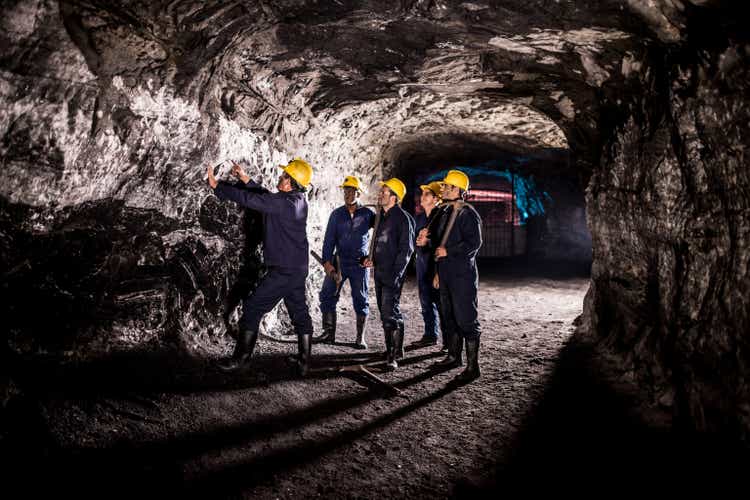 Group of men working at a mine