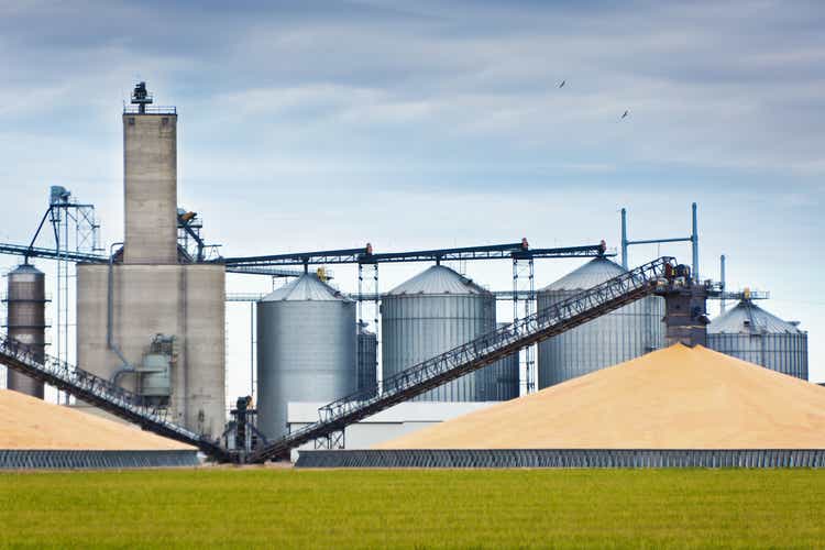 Corn Harvest and Processing Silos in Autumn
