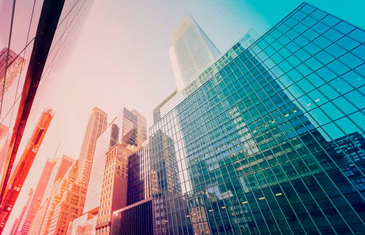 Vintage toned Manhattan skyscrapers at sunset, NYC, USA