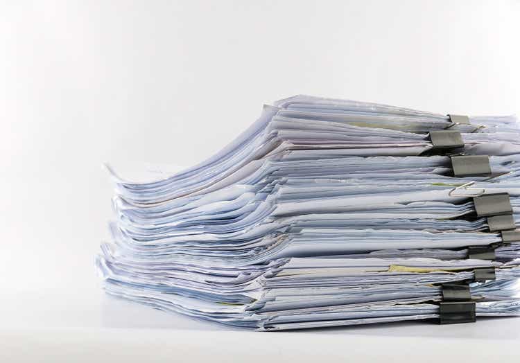 piled up office work papers