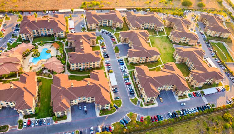 Housing development townhouse apartment complex neighborhood aerial view, Austin Texas