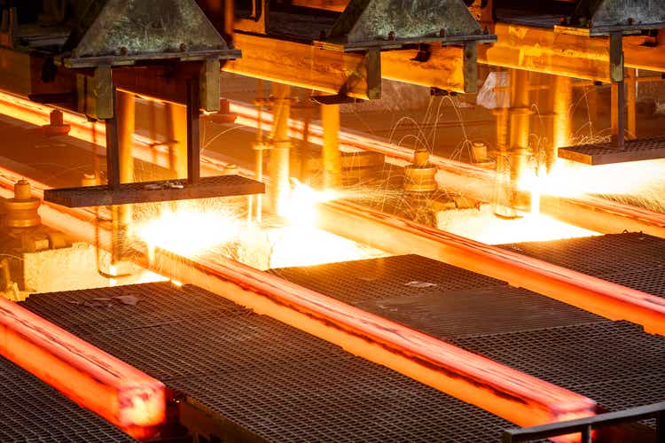 hot steel on conveyor in a steel mill
