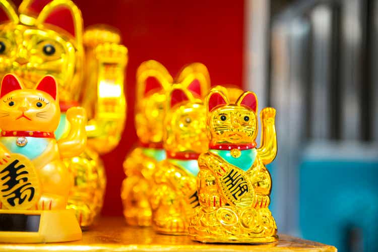Maneki Neko Waving Lucky Golden Cat in Hong Kong China