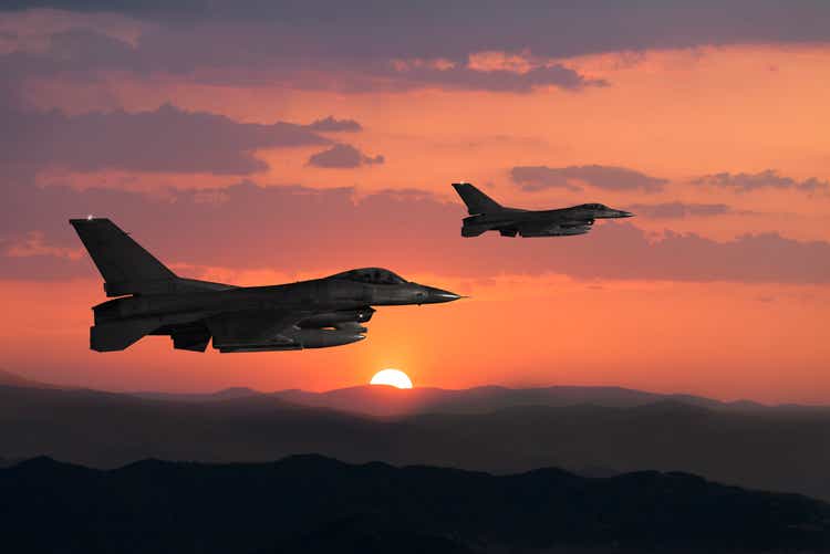 Fıghter Jet in flight at sunset