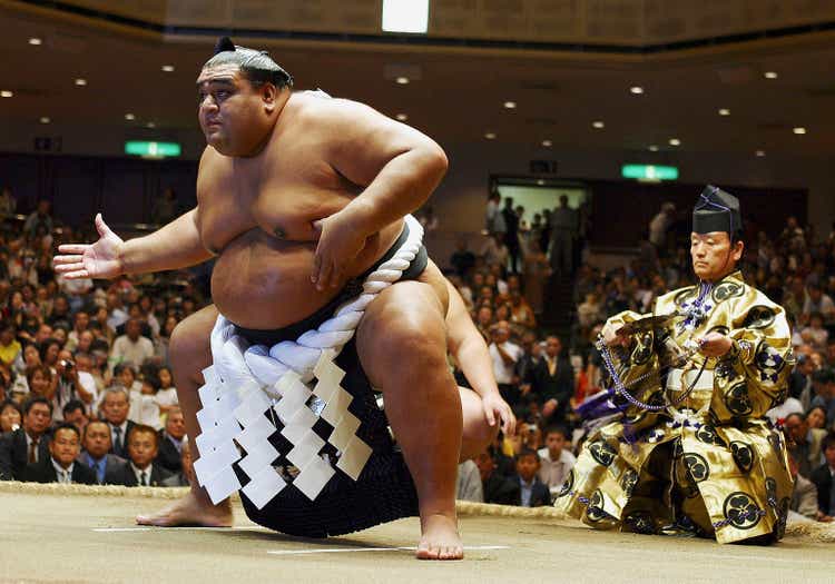 Hawaiian-born Former Grand Champion At His Topknot Cutting Ceremony