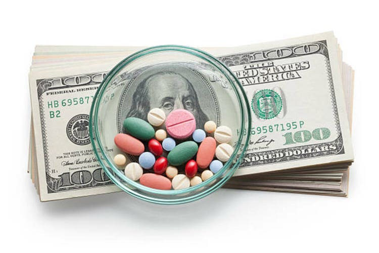 Cost of Healthcare. Pills on US dollars.