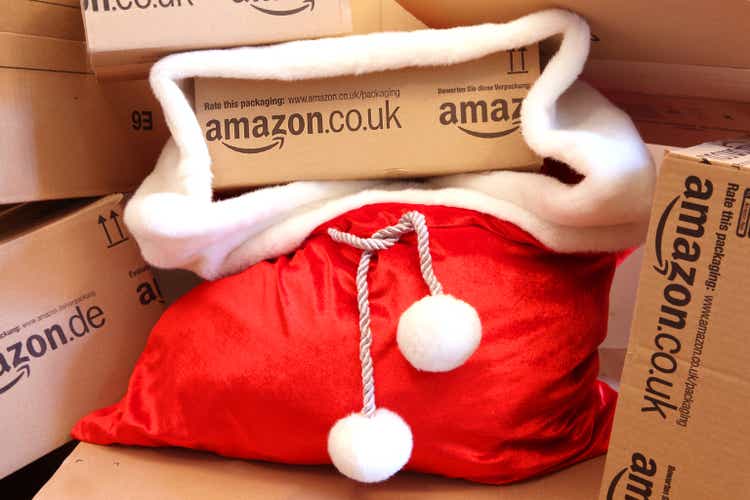 Christmas Shopping Online - Amazon boxes in Red Santa"s Sack