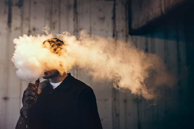 Man Using An Electric Cigarette