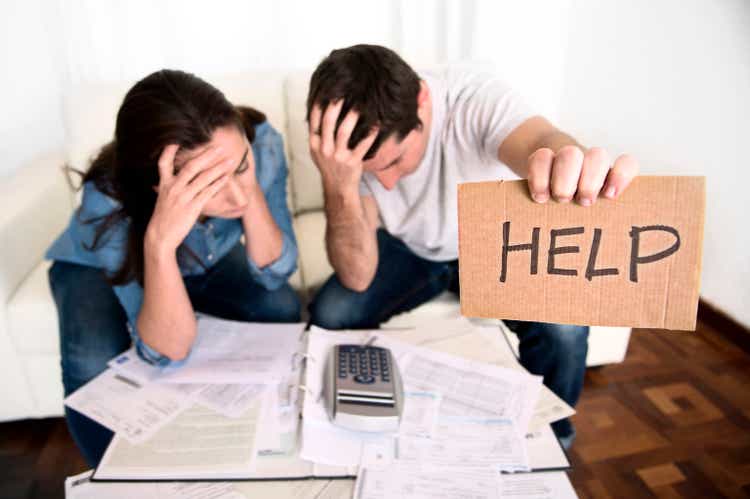 young couple in bad financial situation stress asking for help