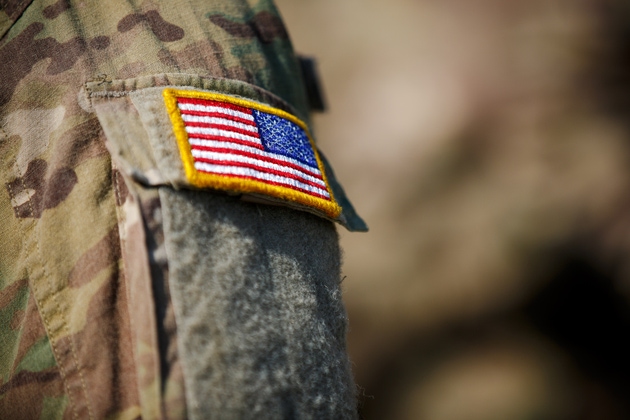 USA flag and US Army patch on solder"s uniform