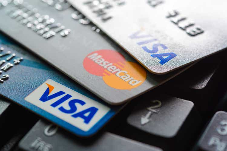 Group of credit cards on computer keyboard