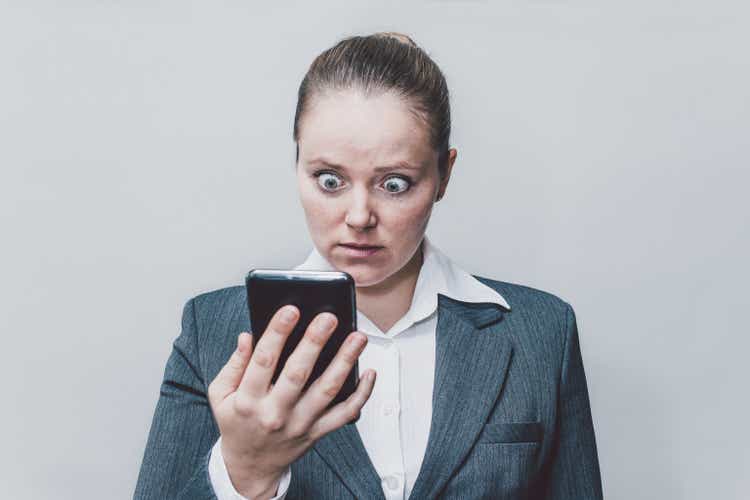 Businesswoman looking surprised.