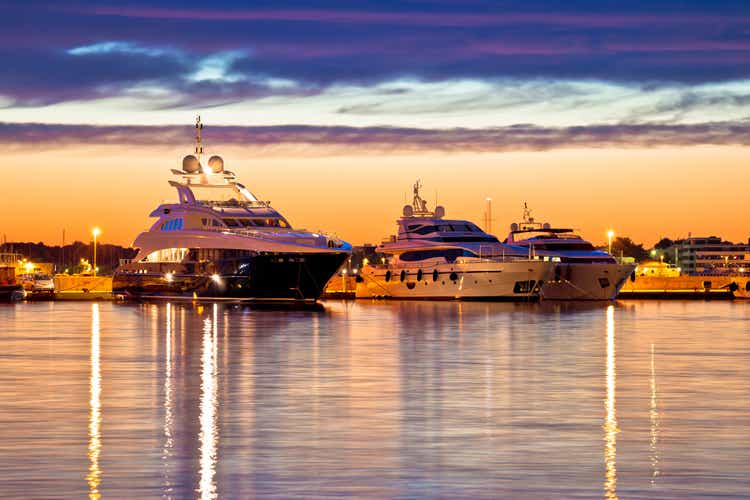 Luxury yachts harbor at golden hour view