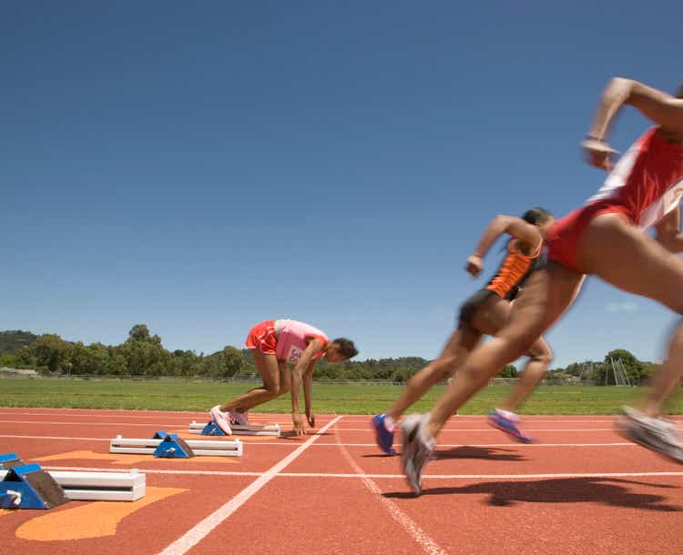 Female track runner lagging behind