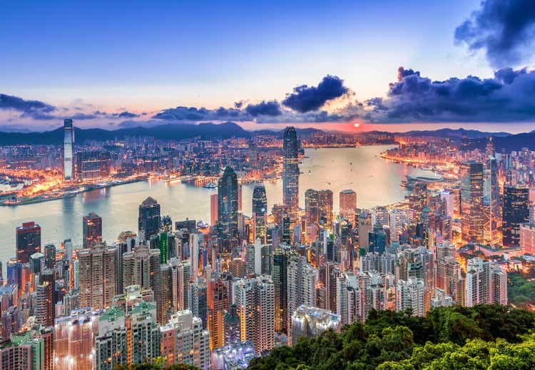 Admire Hong Kong cityscape from sunrise peak