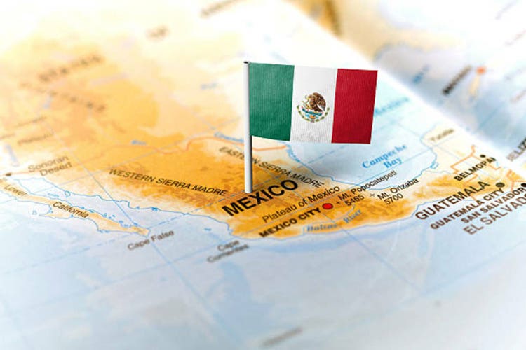 Mexico pinned on the map with flag