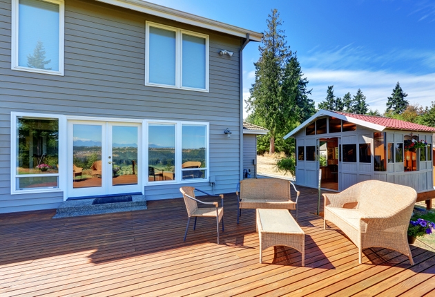 Large walkout deck with wicker furniture