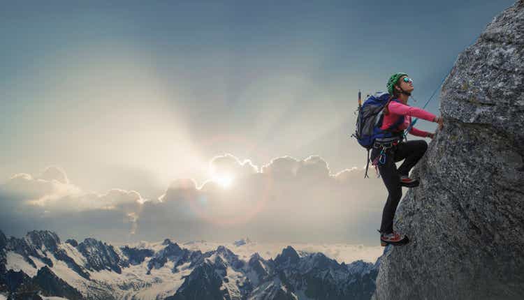 Female climber on a rocky wall