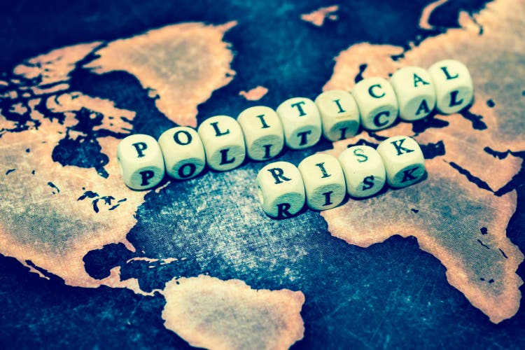 POLITICAL RISK on grunge world map