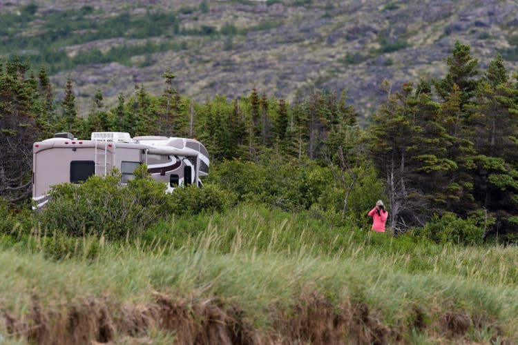 Women photographing in road trip, Motorhome in Labrador, camping