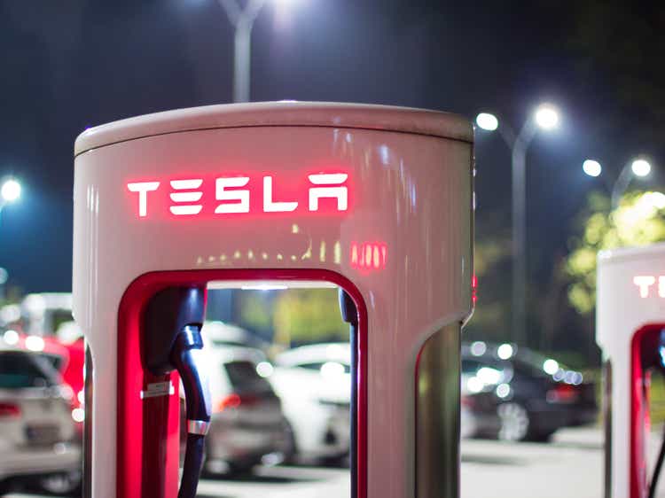 Tesla car charger at night