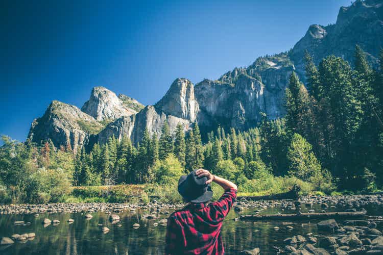 Young woman hiking in majestic landscape