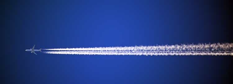 vapor trail in blue sky