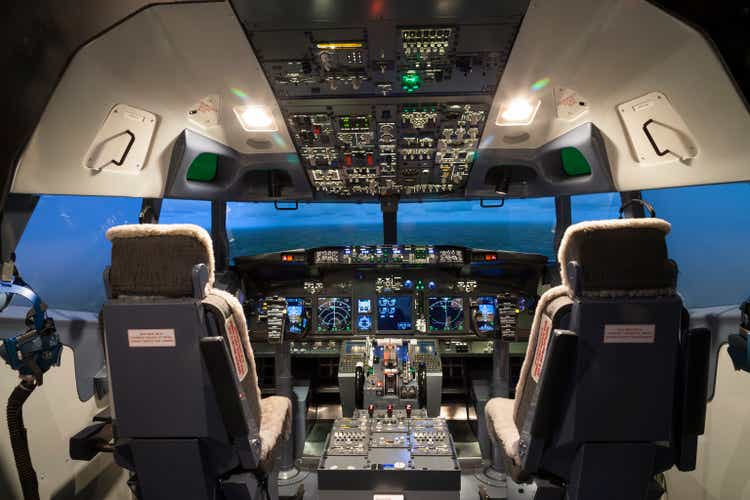 Seat and controller in cock pit of flight simulator