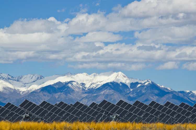 Solar Panels in Power Plant with Sangre de Cristo Mountain