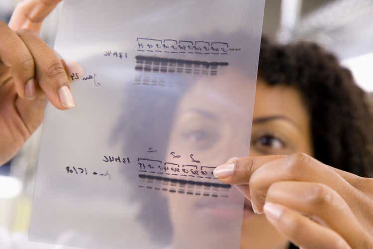 Scientist holding medical samples in laboratory