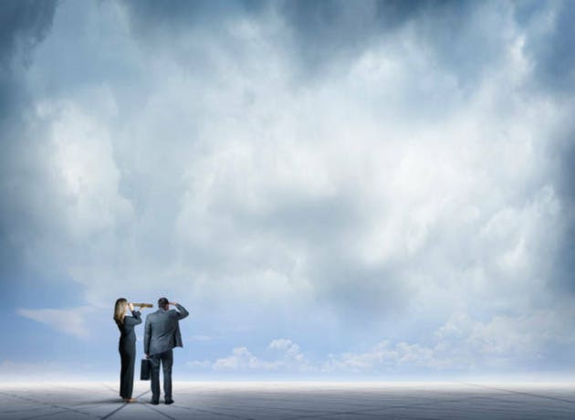 Business People Searching Into The Distance