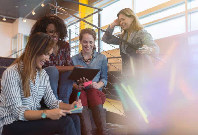 Businesswomen talking in office