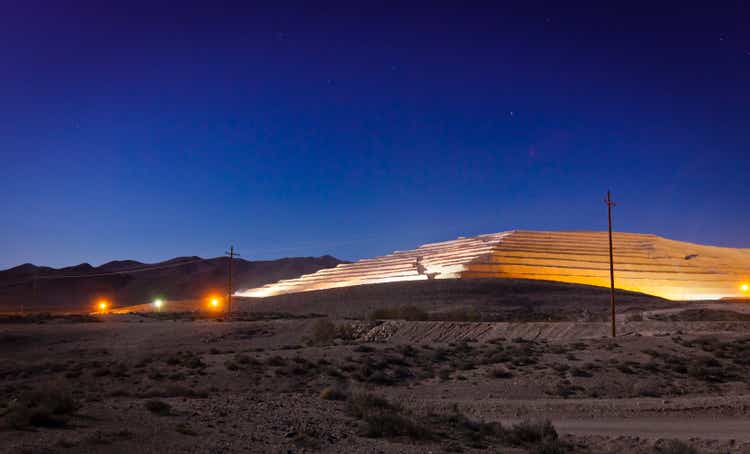 Modern strip mine in the Nevada desert at night.