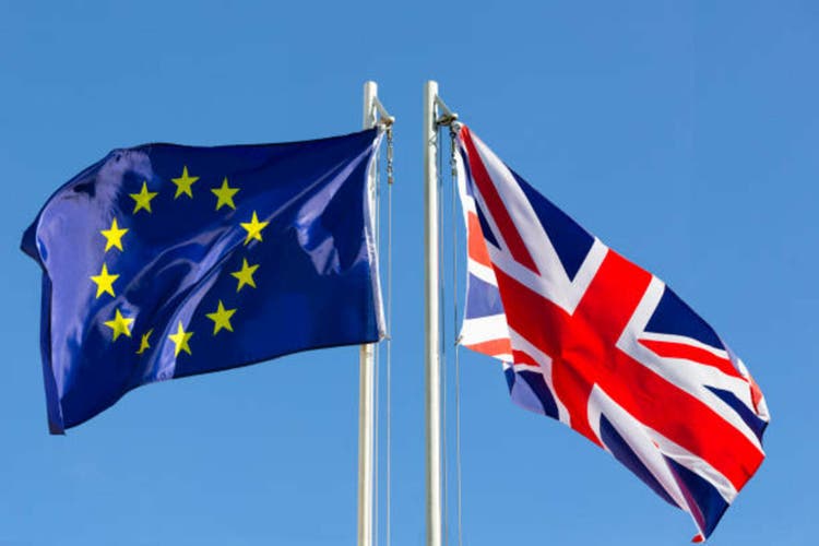 European Union flag and flag of UK on flagpole