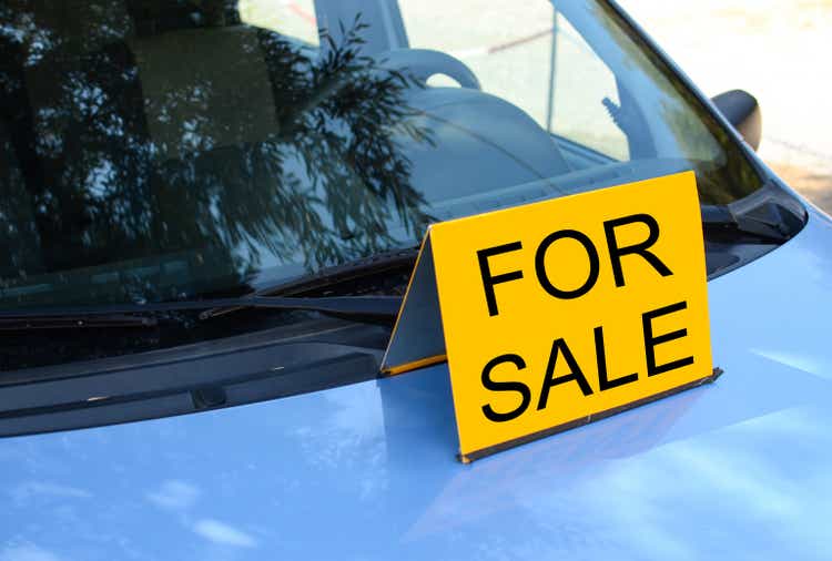 "FOR SALE" sign on car - Sell a car concept