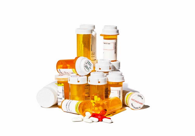 Pile of Prescription Pills and Bottles