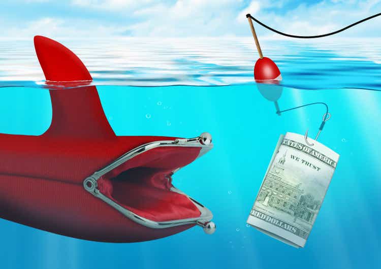 Business risk concept, money bait catch the purse