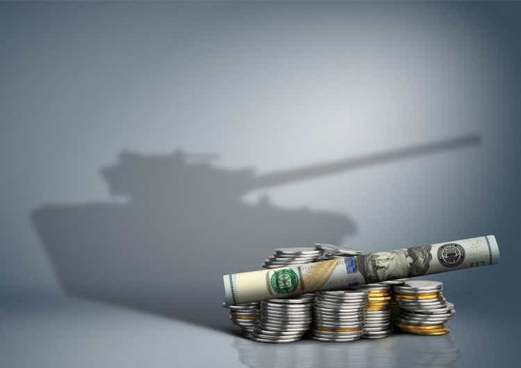 military budget concept, banknote with weapon shadow